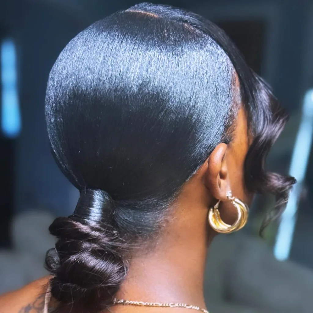 Low Knot with Asymmetrical Bangs