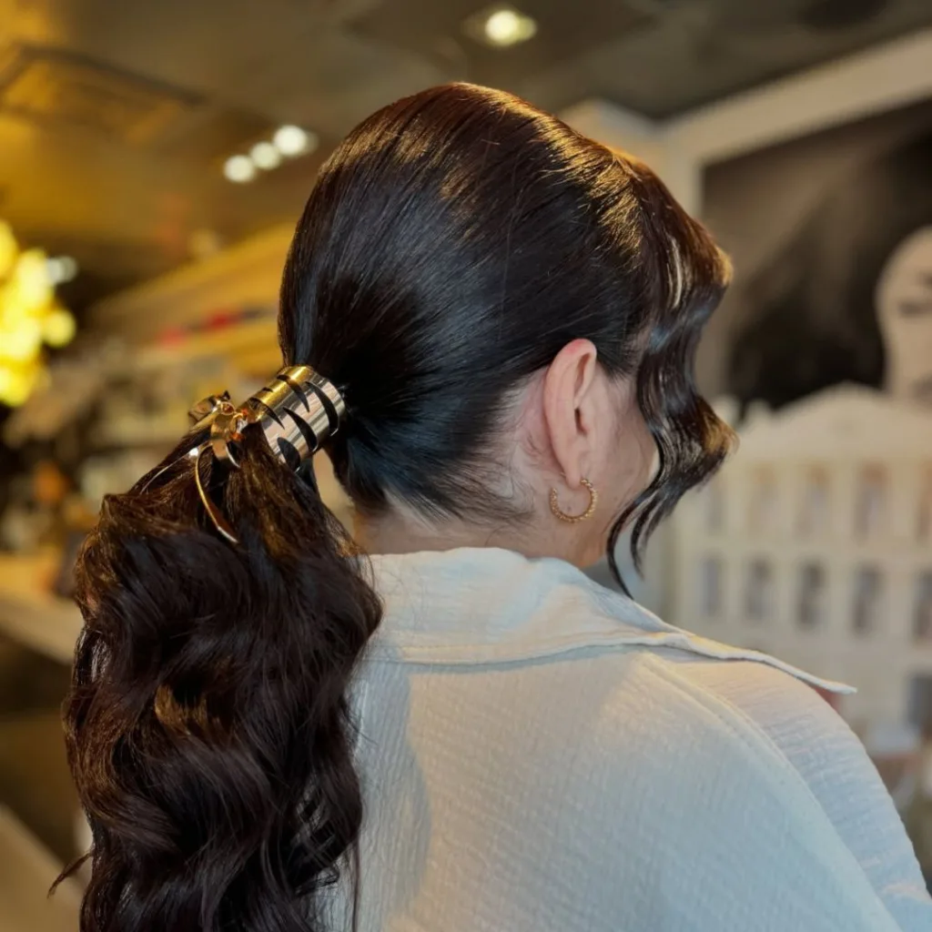 Low Ponytail with Curtain Bangs